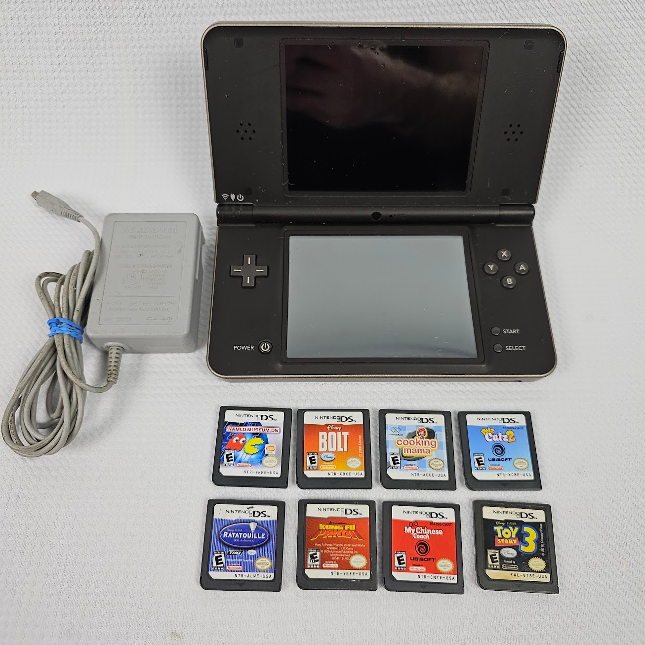 Nintendo DSi XL Bronze Handheld Console Bundle 8 Games OEM Charger Tested