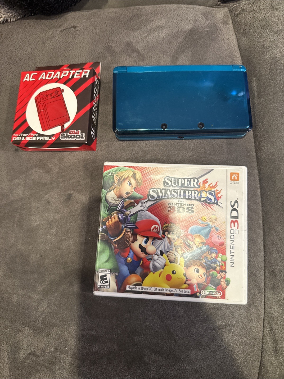 Nintendo 3DS Original Aqua Blue Teal System & Super Smash Brothers Game Charger