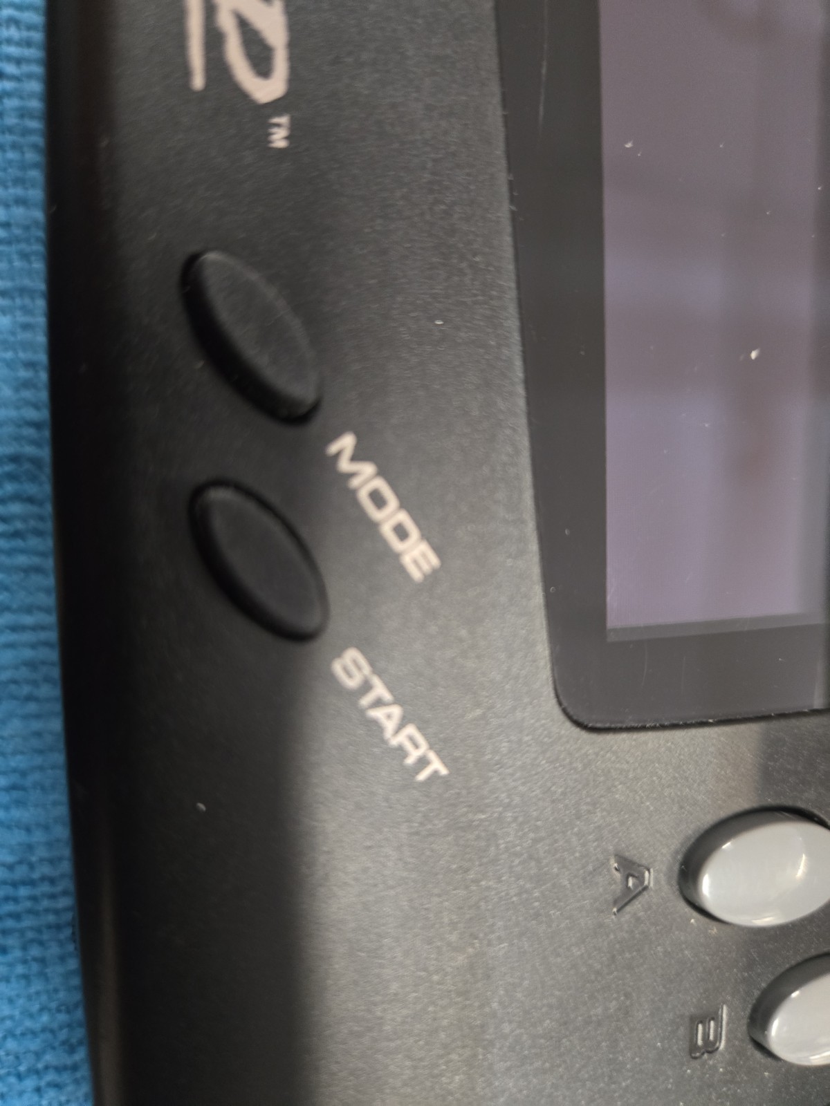 Sega Nomad Console. With Box (no inserts). A/C adaptor. Battery holder missing..
