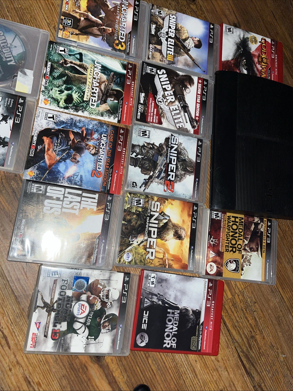 Sony PlayStation 3 Super Slim CECH-4001B 250GB Black Games Controller Bundle