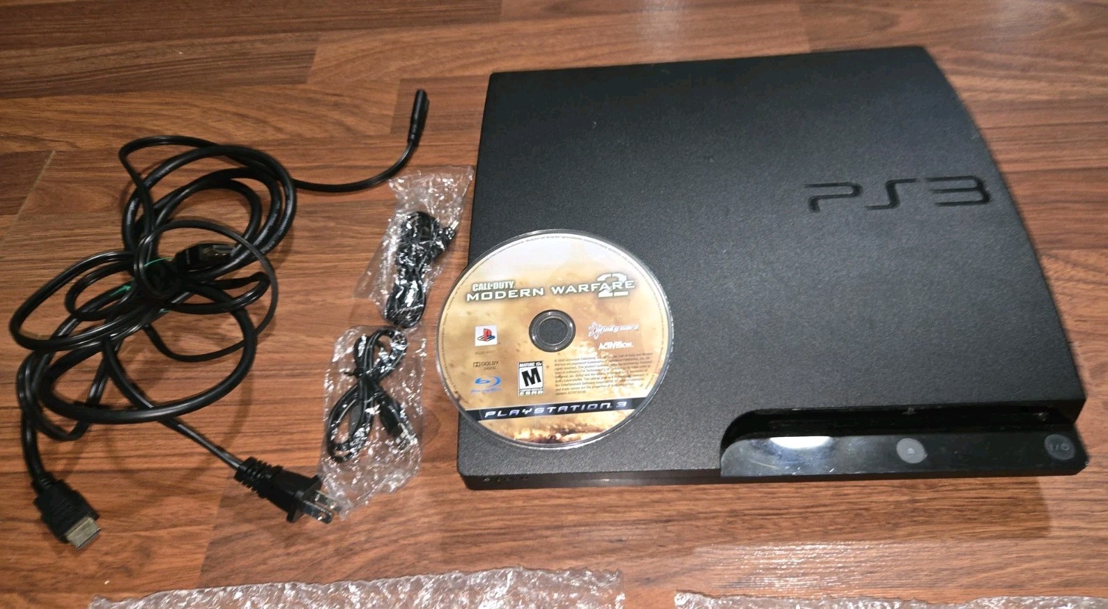 Sony PlayStation 3 PS3 Slim 160GB Console w 2 Wireless Controllers, Call of Duty