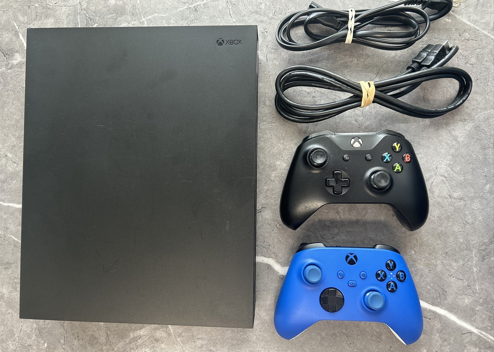 Microsoft Xbox One X Project Scorpio Edition 1TB Console – Black & 2 Controllers
