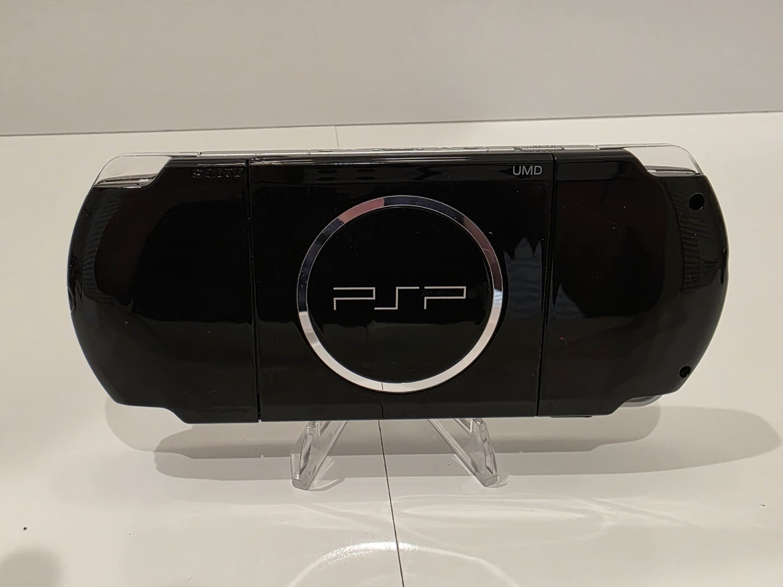 Sony PSP 3001 Black Handheld Console with Charger, Car Adapter, and 5 Games.