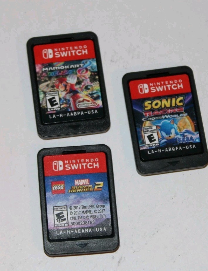 Nintendo Switch Console Model HAC-001(01) Bundle w/ 3 Games, Carrying Case, Extr
