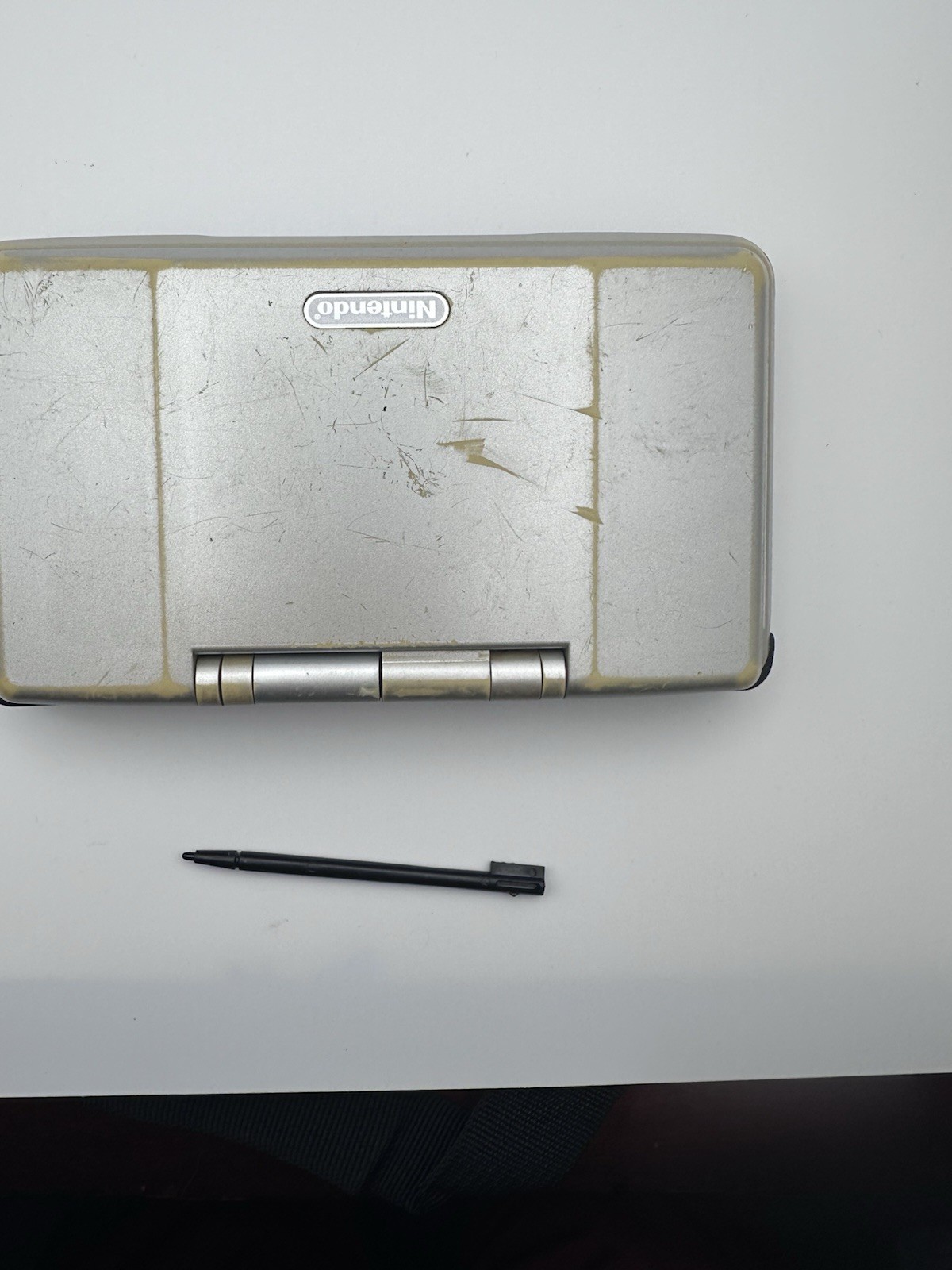 Nintendo DS Silver with Stylus/ Disney Brother Bear game included/ NO CHARGER
