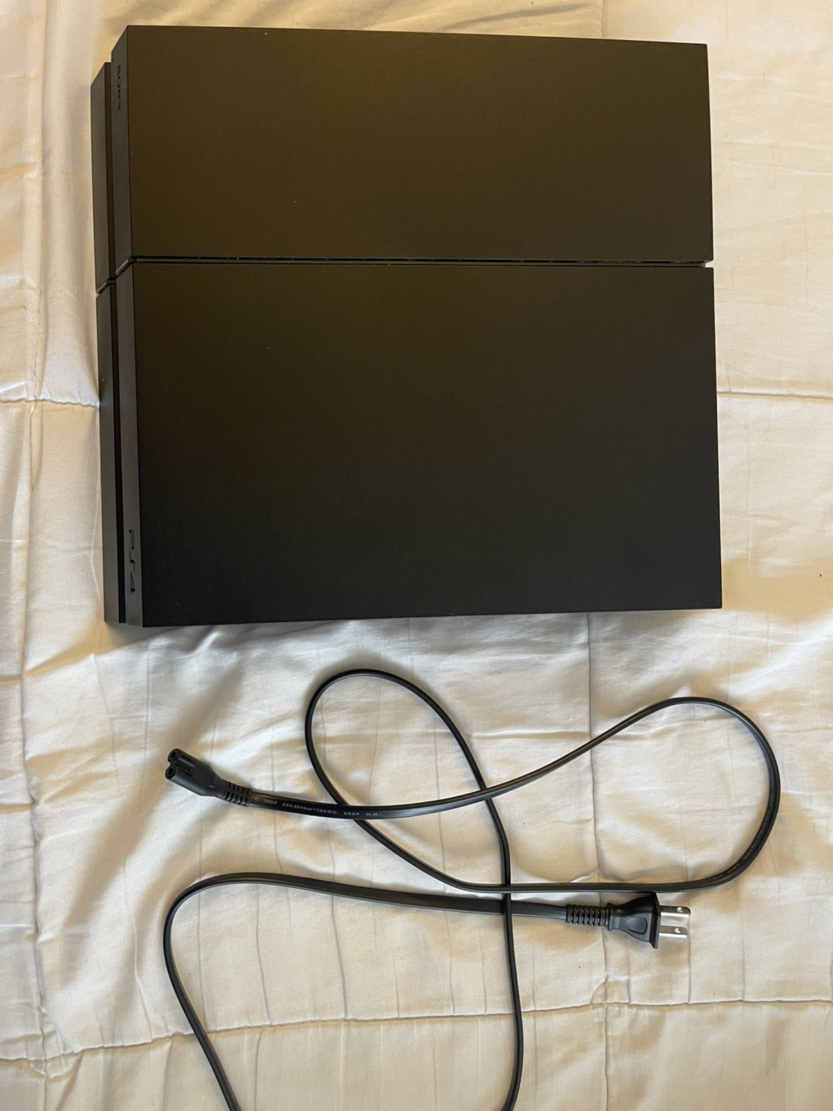 Working PS4 500GB console, w/power cord, PS4 controller, and 5 PS4 games