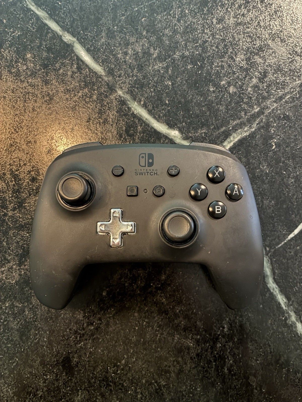 Used Nintendo Switch with Pro Controller in excellent condition