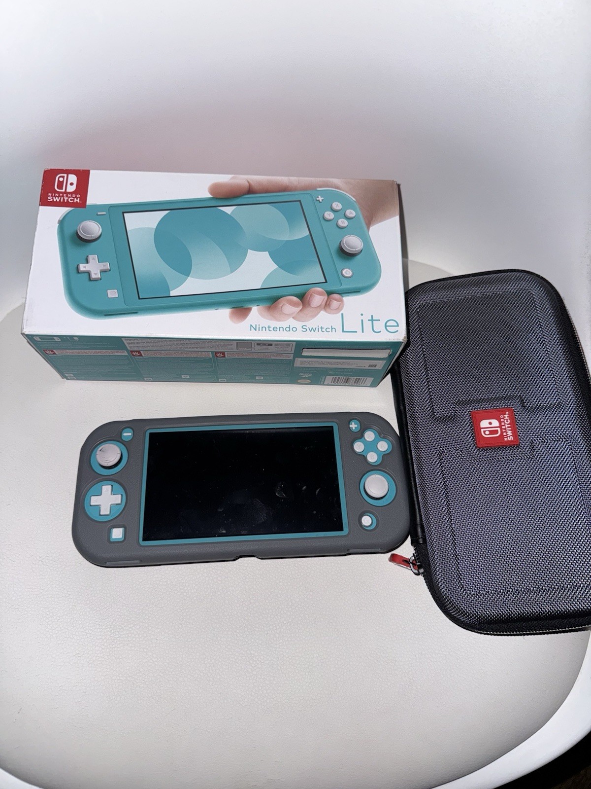 Nintendo Switch Lite Turquoise Blue With A Case And Screen Protector