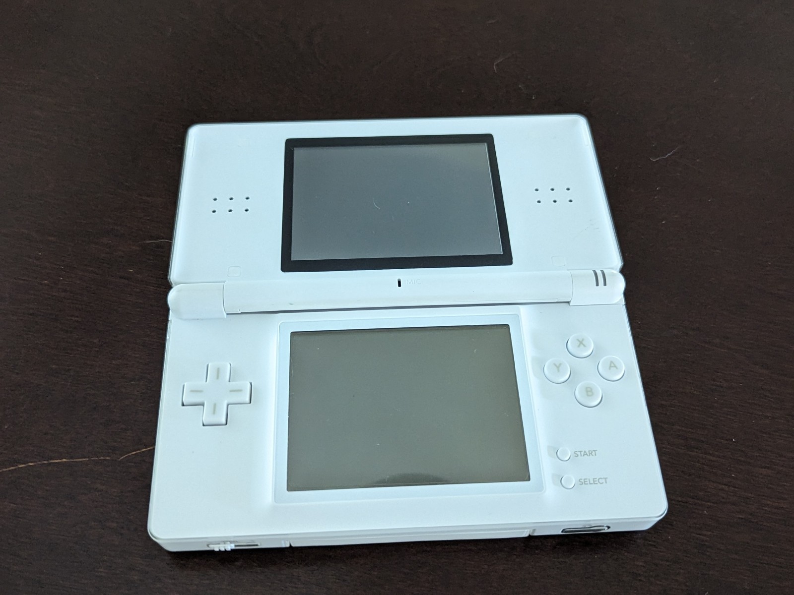 Nintendo DS Lite with Charger, Hard Case, soft case, 15 games in cases.