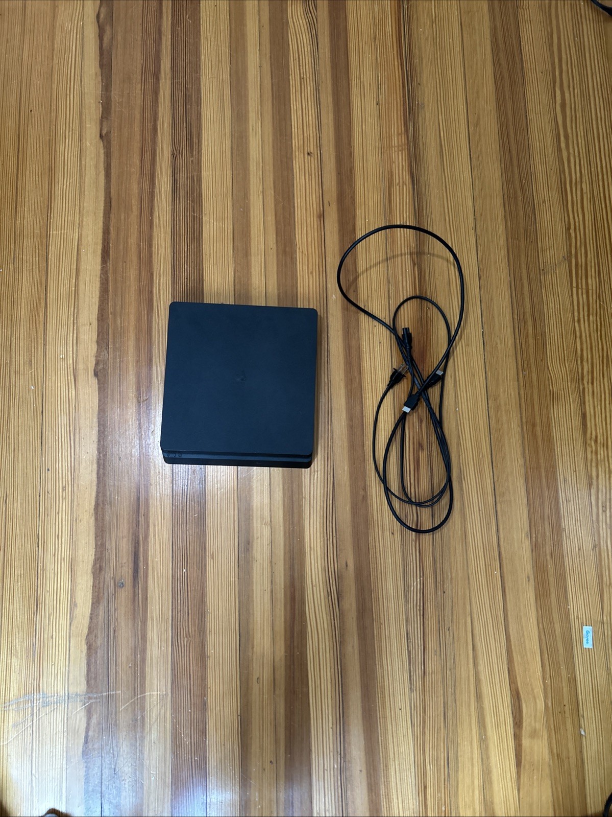 PS4 Slim Black Console Pre-owned Includes Power Cord And HDMI Cord