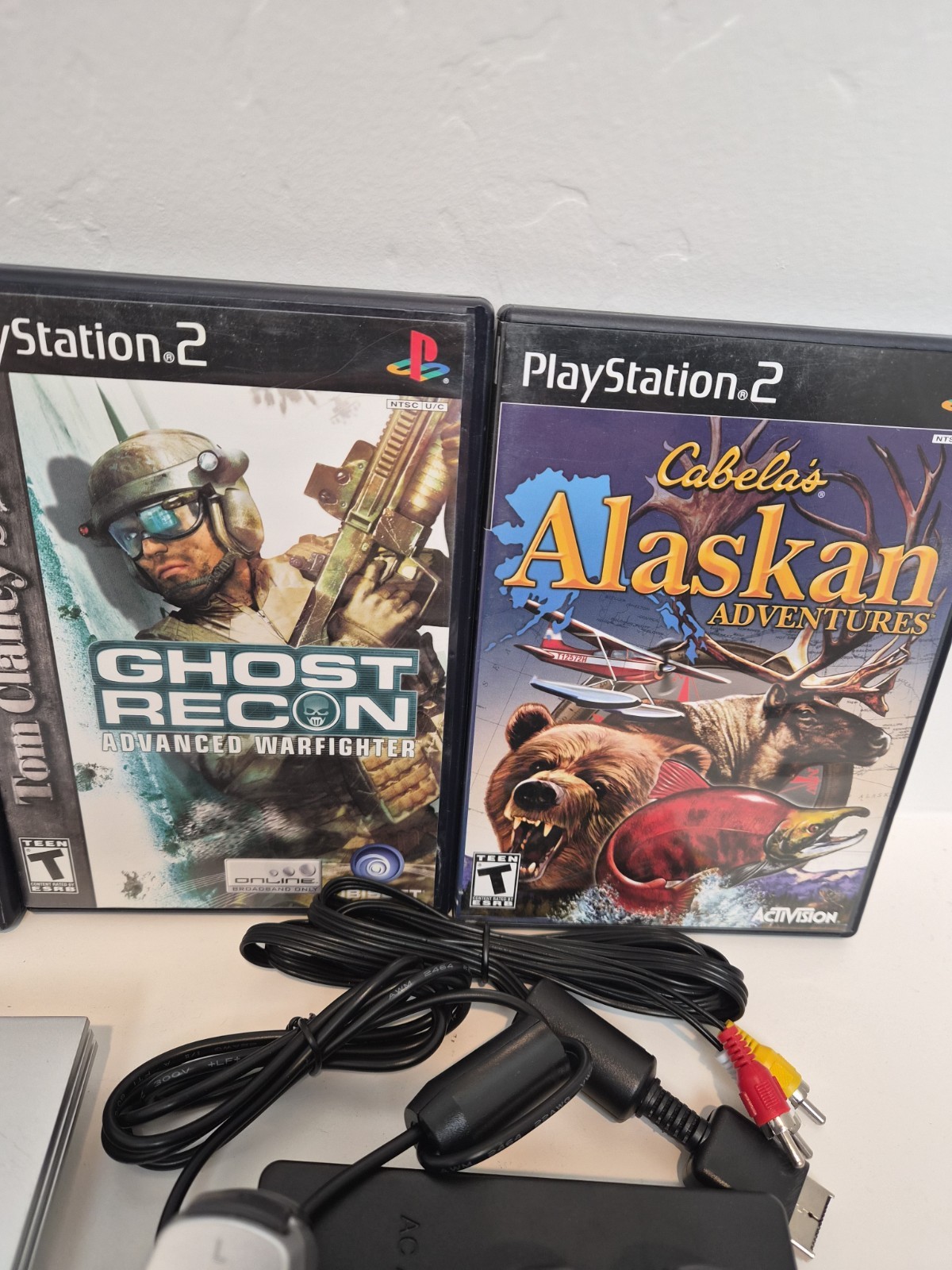 NEW LASER Silver PS2 Slim SCPH-77001 Bundle -NEW BATTERY – Cleaned 4 games Cords