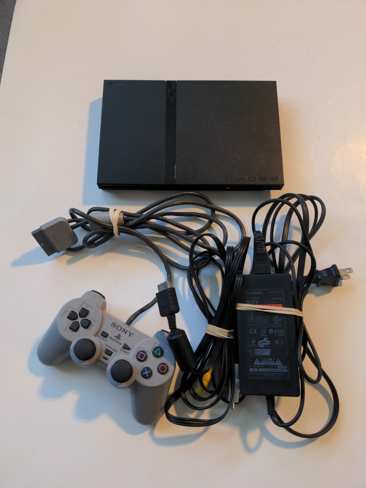 Sony Playstation 2 Slim SCPH-77001 READ DESC – PLAYS only PS1 Games & Blue Discs
