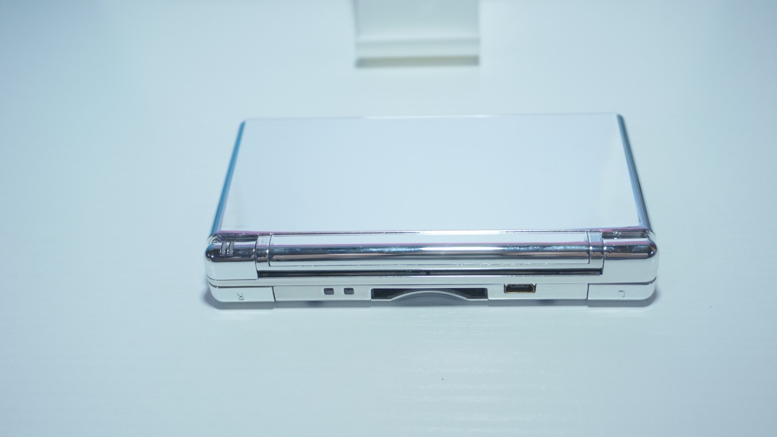 Nintendo DS Lite Metallic Chrome Silver Mirror Handheld Game System w/ Charger