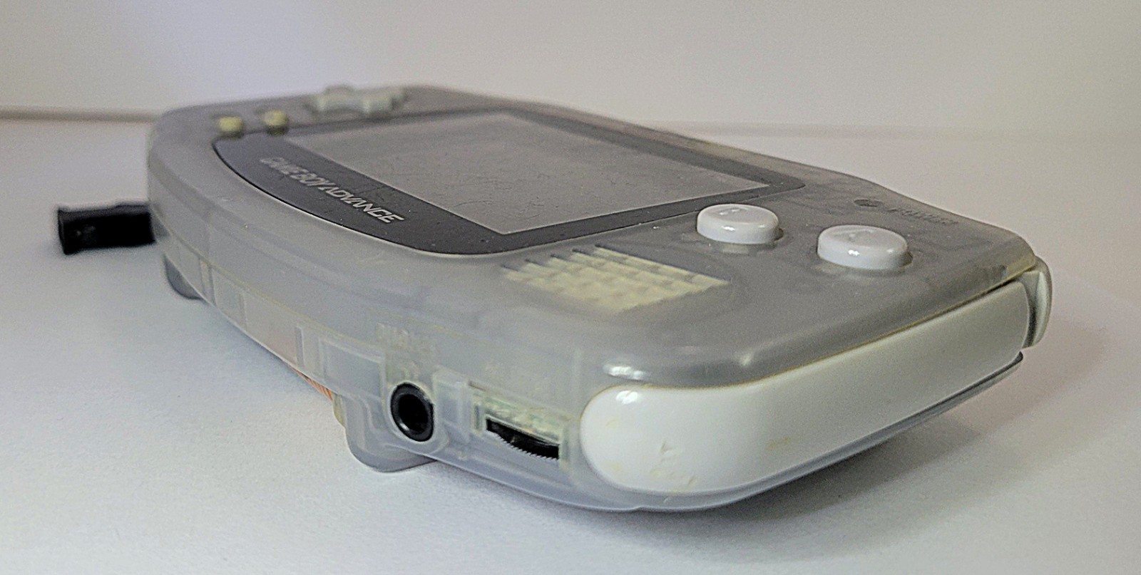 Working Nintendo Game Boy Advance Console in Clear Glacier with No Battery Cover