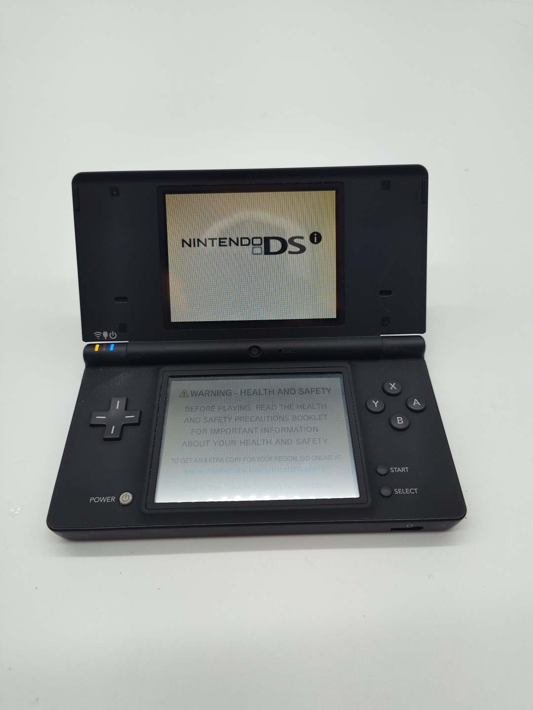 Nintendo DSi Game Console Only No Stylus TESTED AND WORKING/ Has Yellowed Screen