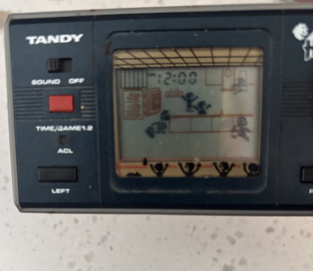 Vintage 1983 Tandy Hold Up LCD Game Handheld Electronic Game 60-2173 Works READ