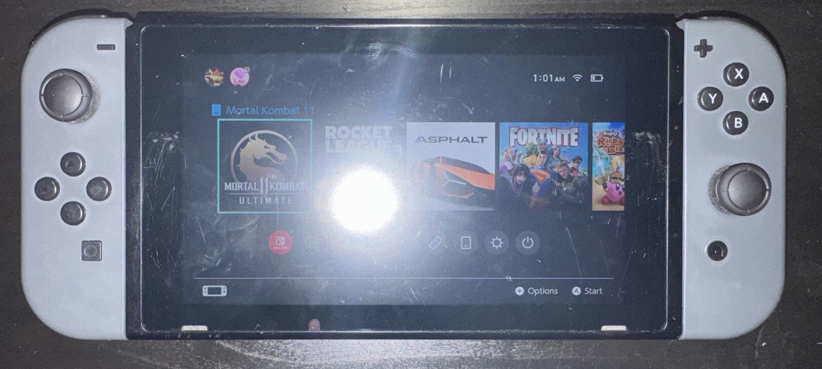 Nintendo Switch console 25.6GB with sandisk 128GB SD card