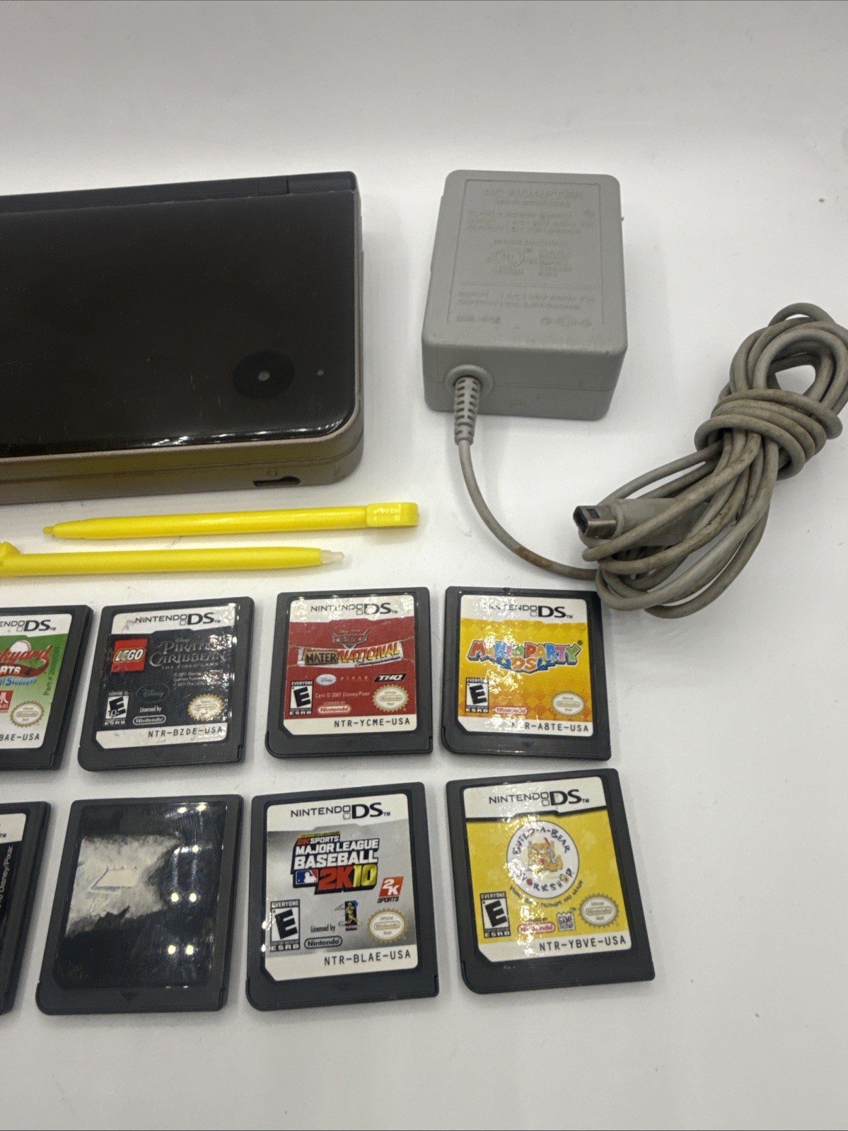 Nintendo DSI XL Handheld Console Bronze UTL-001 Bundle 8 Games, Charger, Stylus
