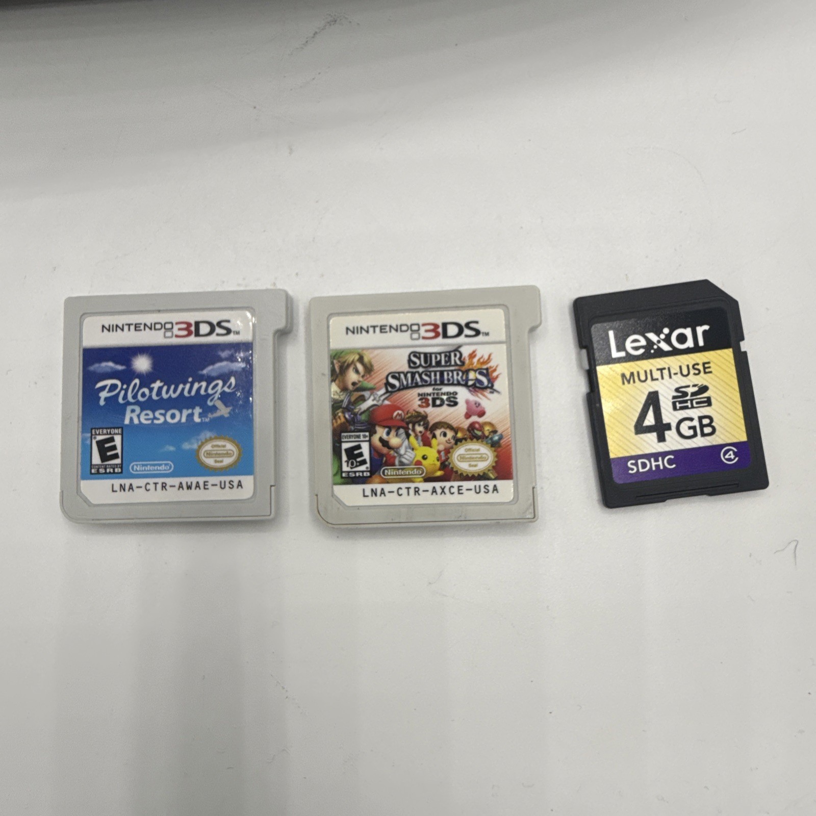 Nintendo 3DS XL Blue Console Bundle: Case, Charger, 4GB SD Card, Stylus, 2 Games