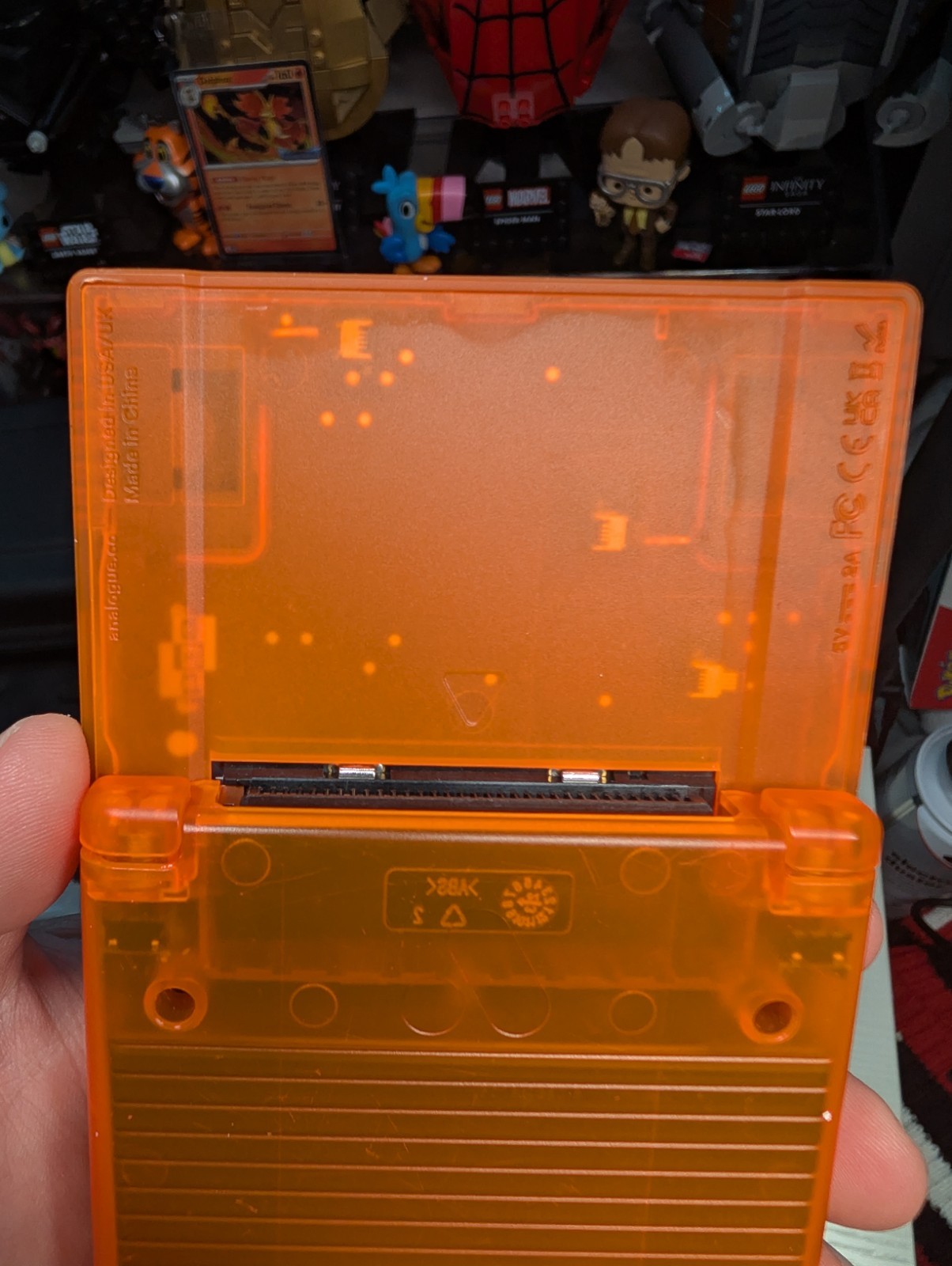 Analogue Pocket Handheld – Transparent Orange Limited Edition w/ pokemon silver