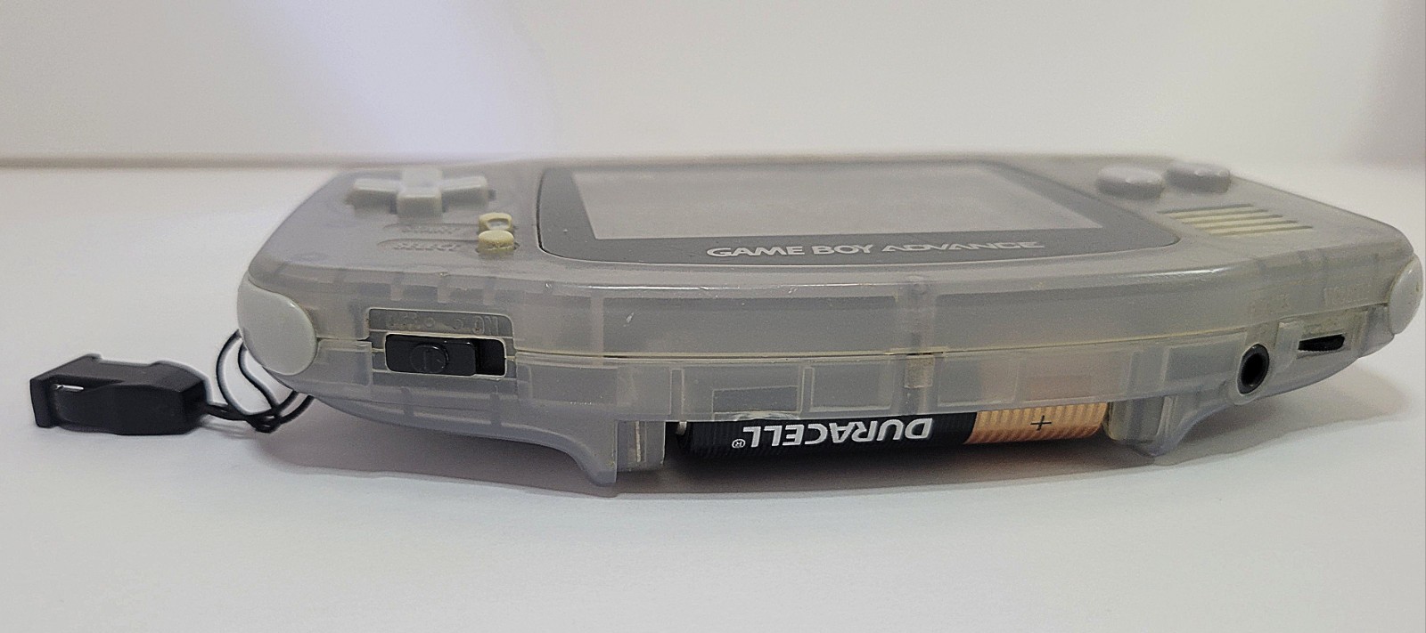 Working Nintendo Game Boy Advance Console in Clear Glacier with No Battery Cover