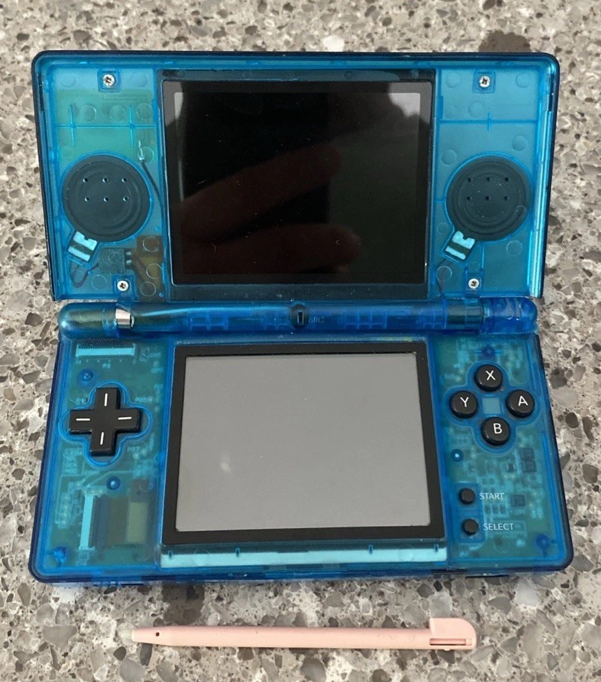 Nintendo DSi Handheld Game Console Clear Blue – No Charger – Pink Stylus