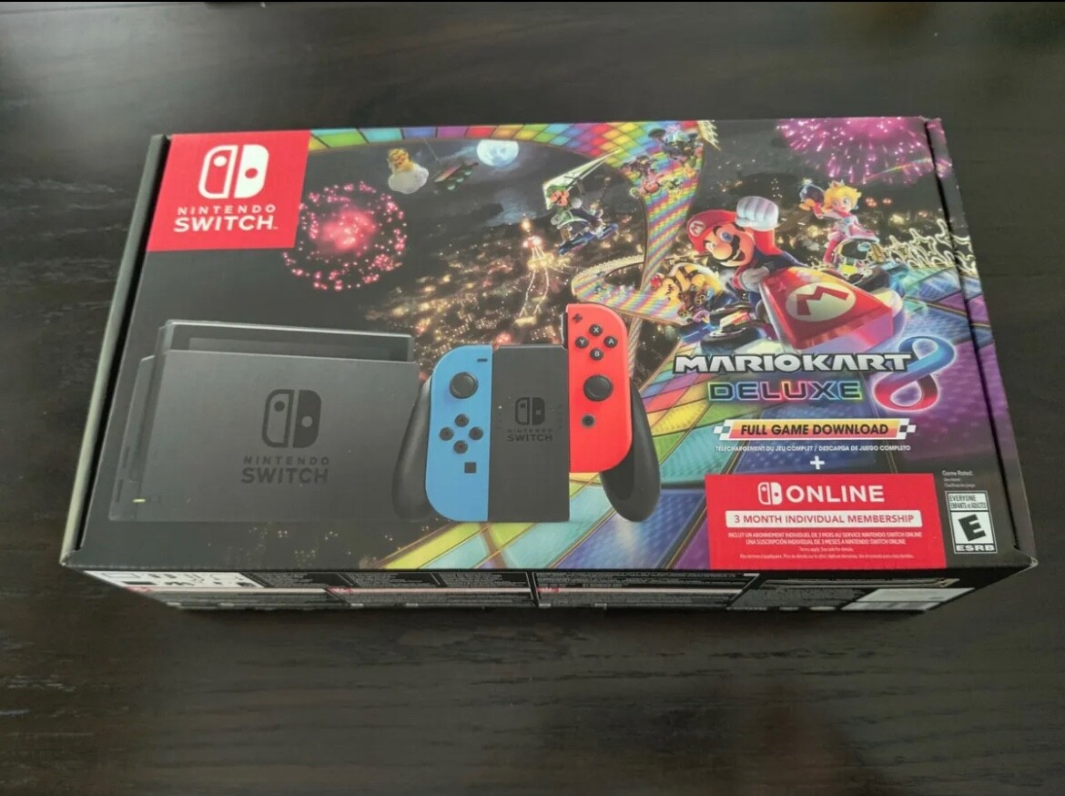 Nintendo Switch HAC-001(-01) with Blue and Red Joy-Con Controllers and Mario…