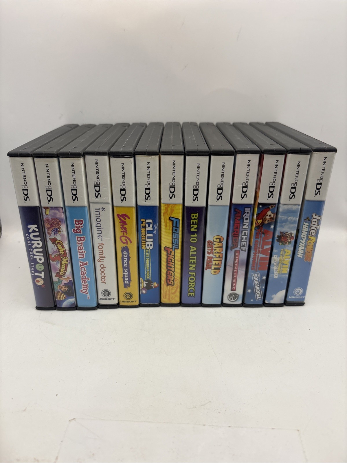 Nintendo DS Lite Metallic Rose Pink Console Bundle 13 Games Fossil Fighters CIB