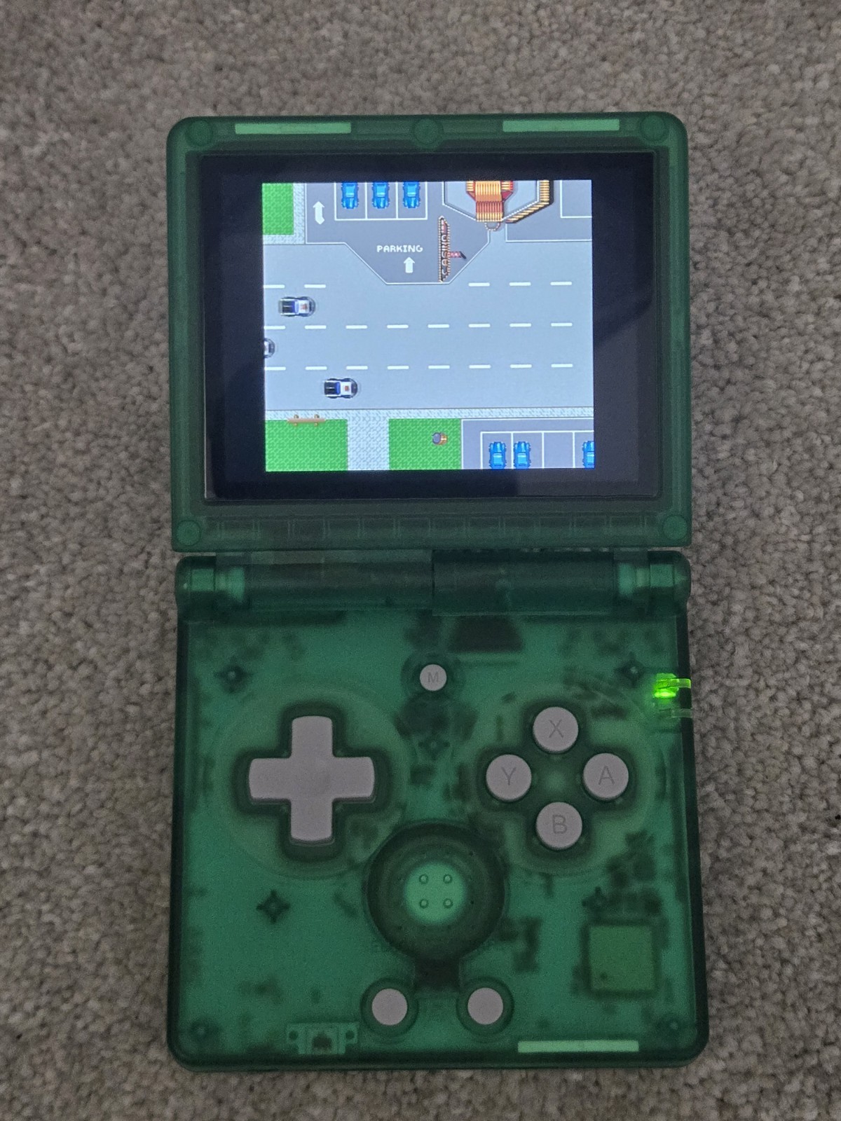 Anbernic game console RG35XXSP retro handheld transparent green tested arcade
