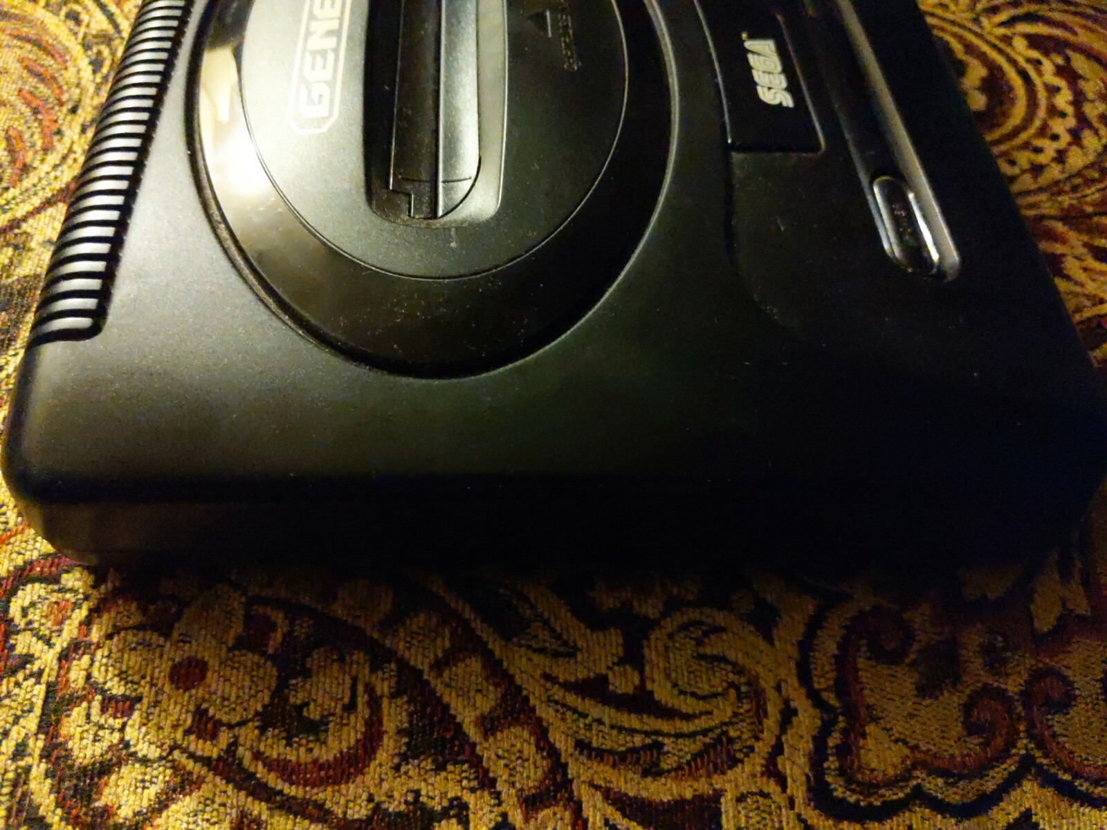 SEGA Genesis Black Home Console does not include a power cord and tv adapter