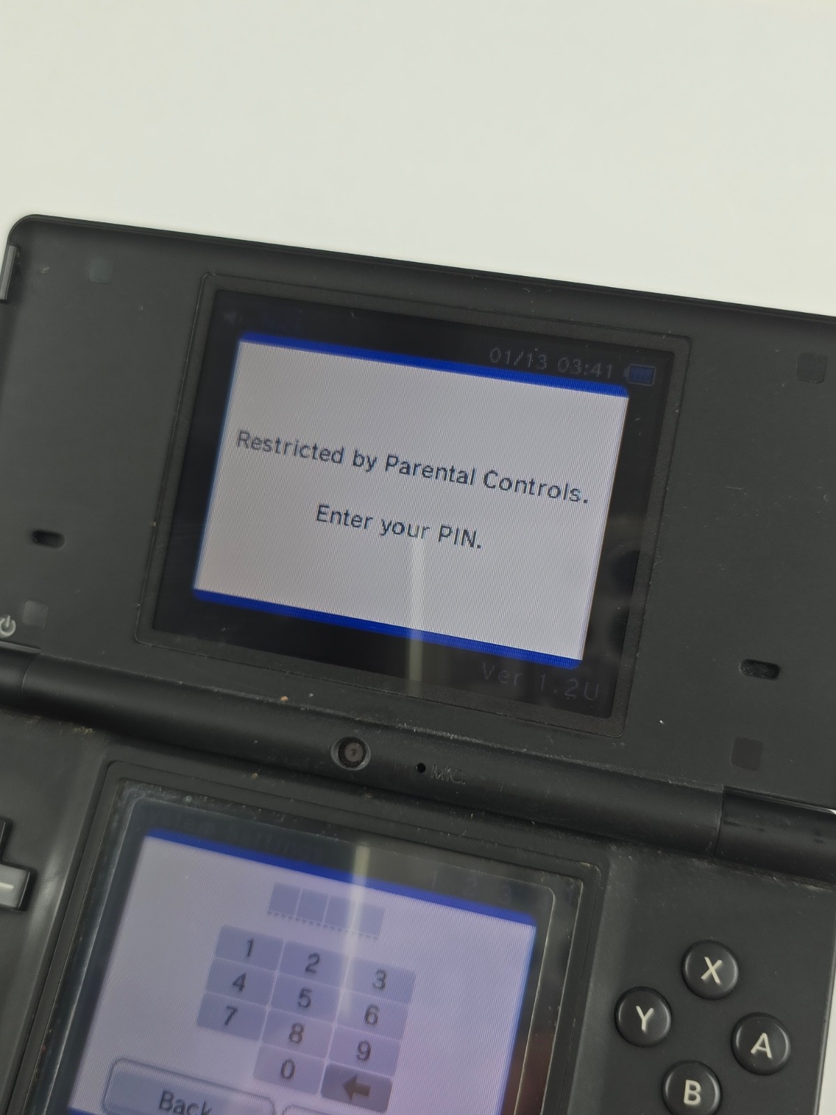 Nintendo DSi TWL-001 Black handheld system w/ Mario Kart -needs charger