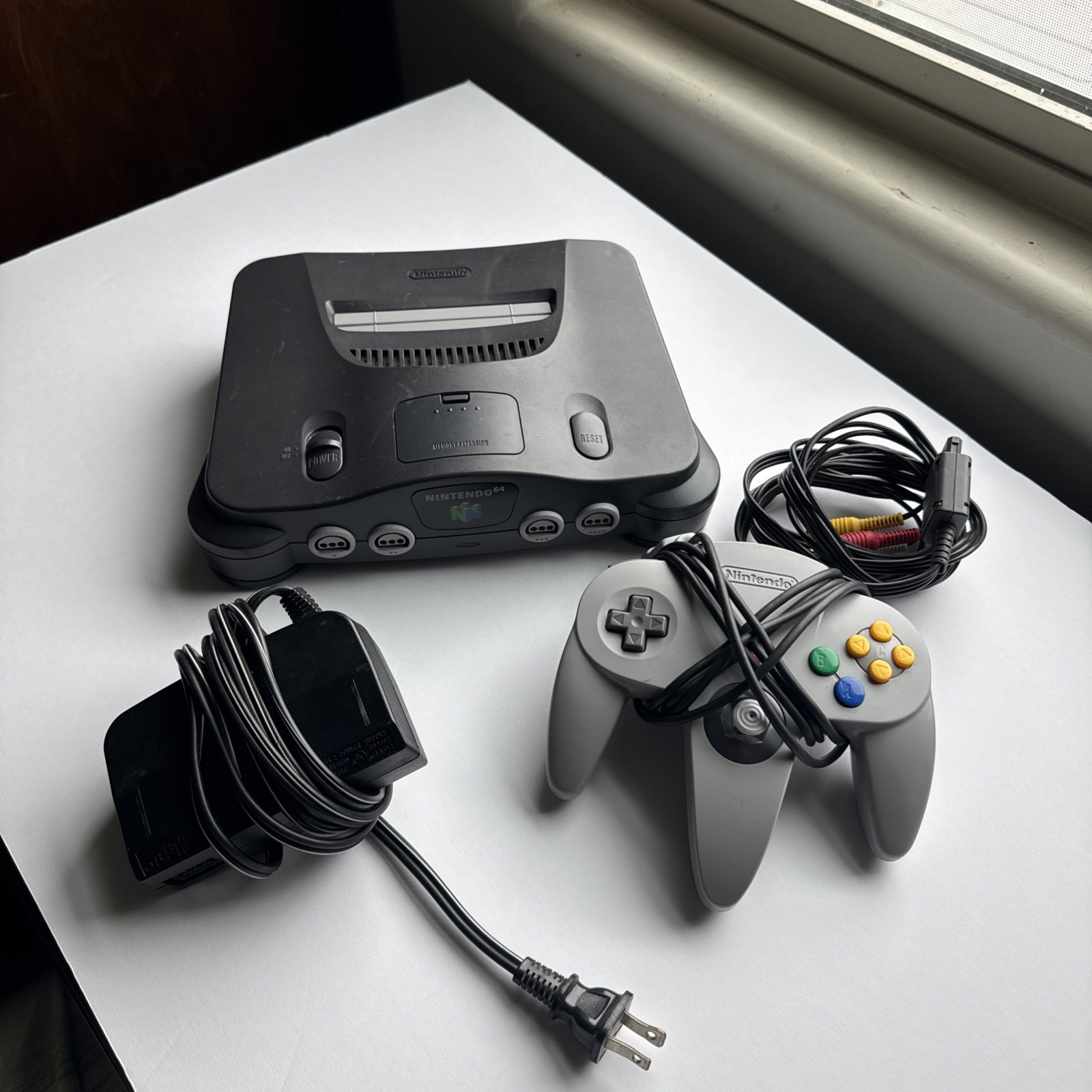 Nintendo 64 System 1 Controller and Cables included. NO RAM