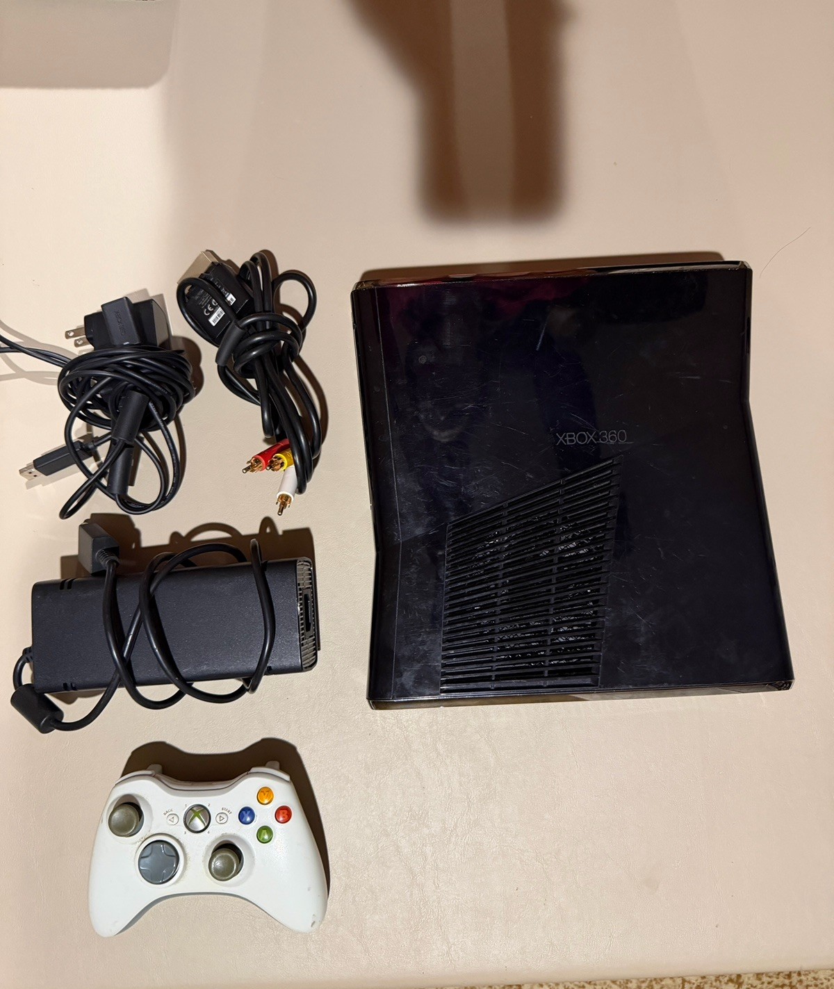 Microsoft Xbox 360 Slim 250GB Black Console, White Controller And Cords(NTSC)