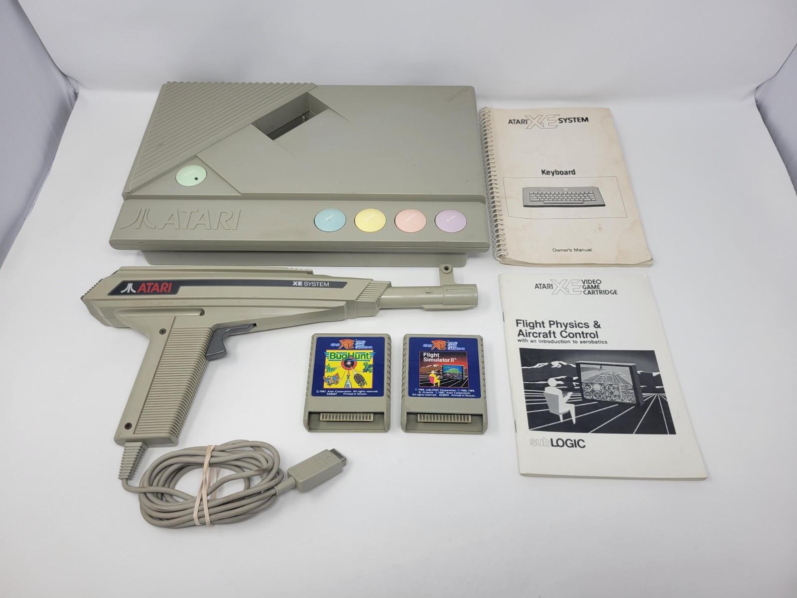 Atari XE System Console + Light Phaser + 2 Games + Manuals Untested Free US Ship