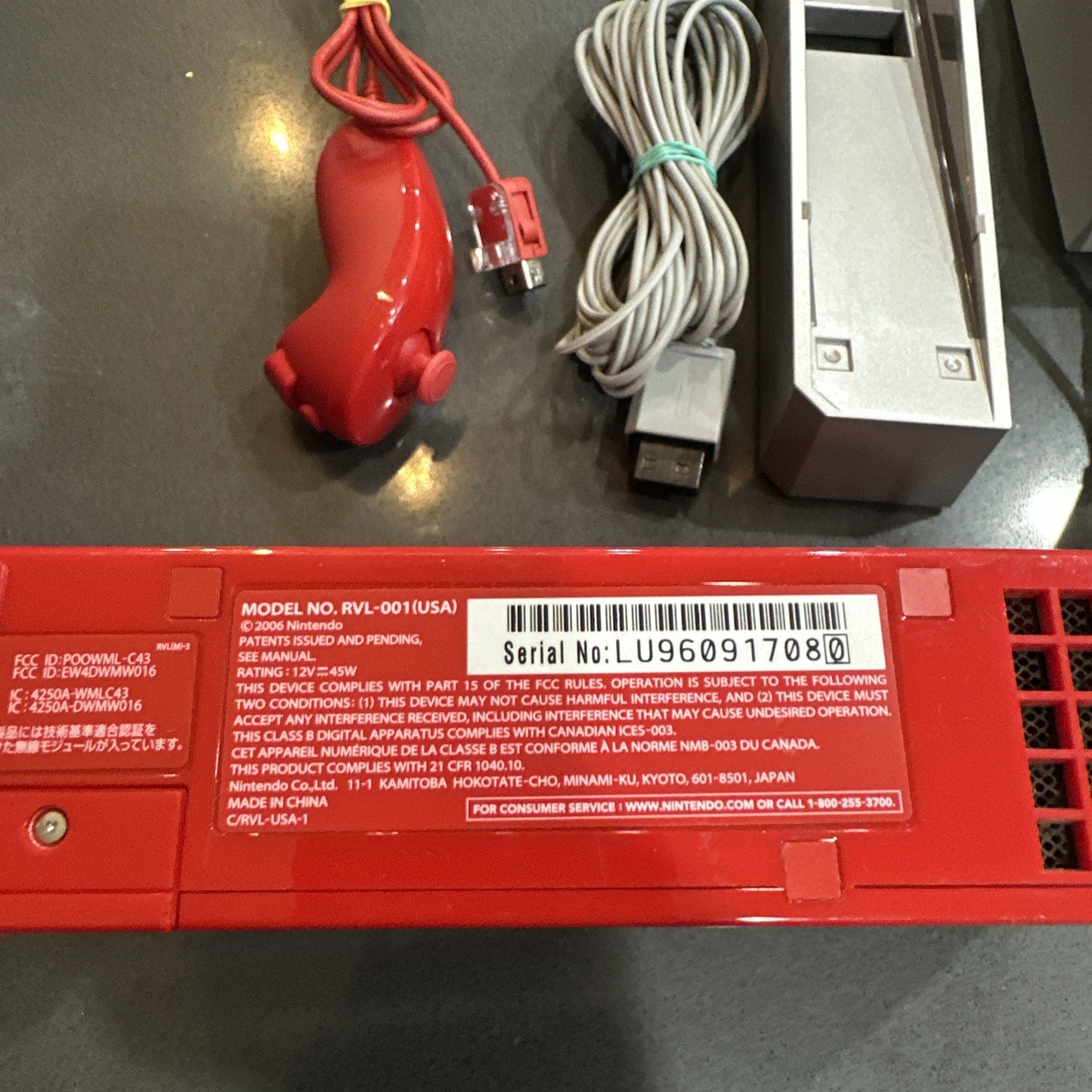 Nintendo Wii Red 25th Anniv Ed. RVL-001 Console, power supply, ac and nunchuck