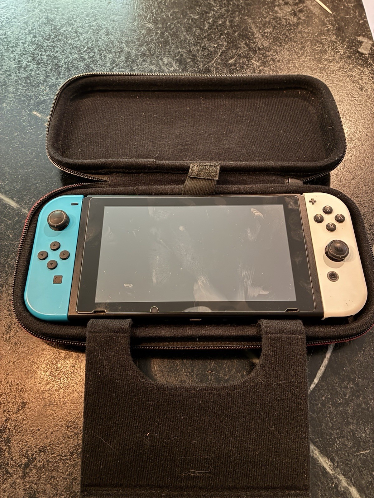 Used Nintendo Switch with Pro Controller in excellent condition