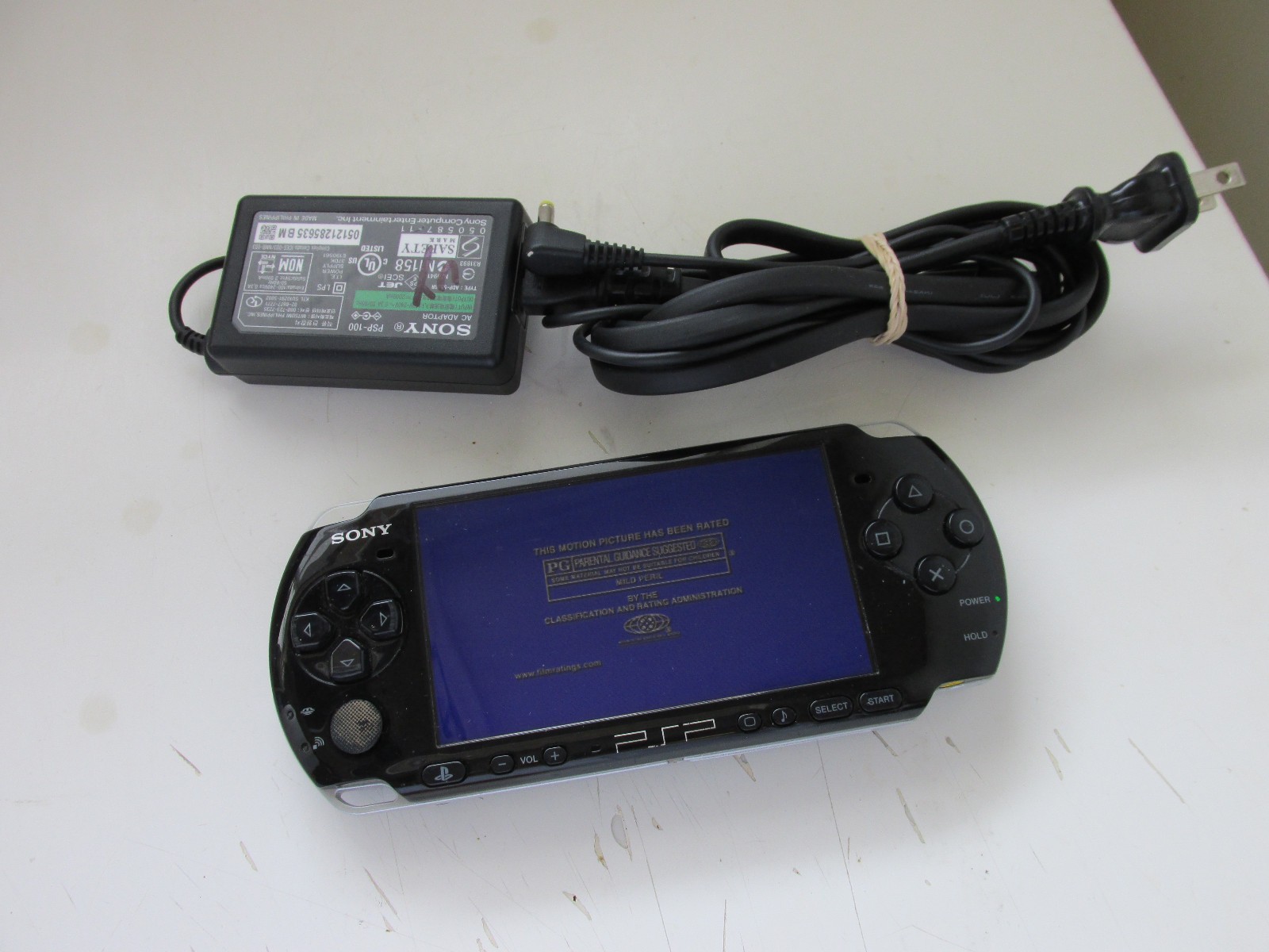 Sony PSP-3001 Handheld Console W/ Charger & 1 Disc Tested Working.