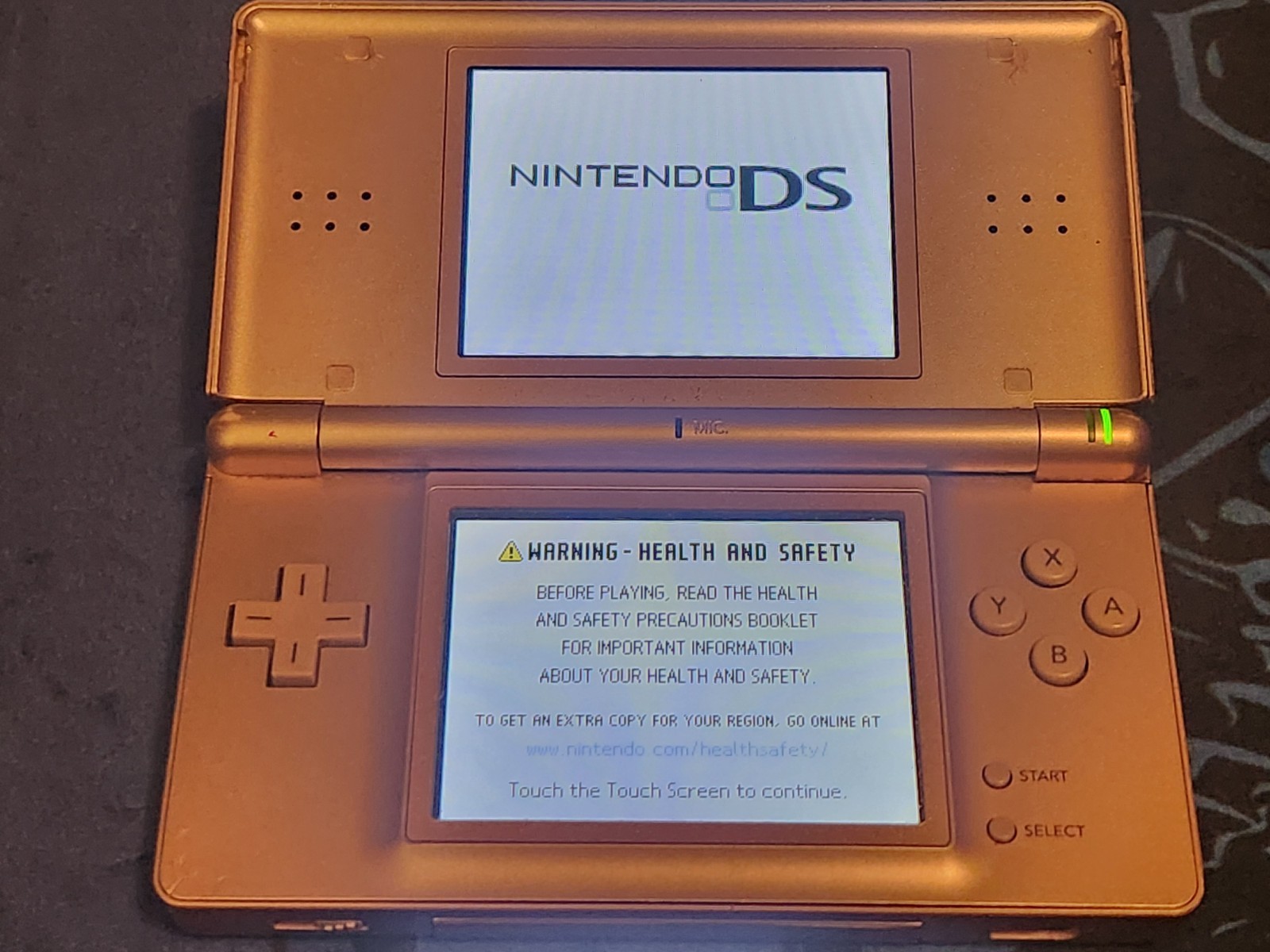 Nintendo DS Lite System, With Stylus, Charger, GBA Cover Metallic Rose w/ 2games