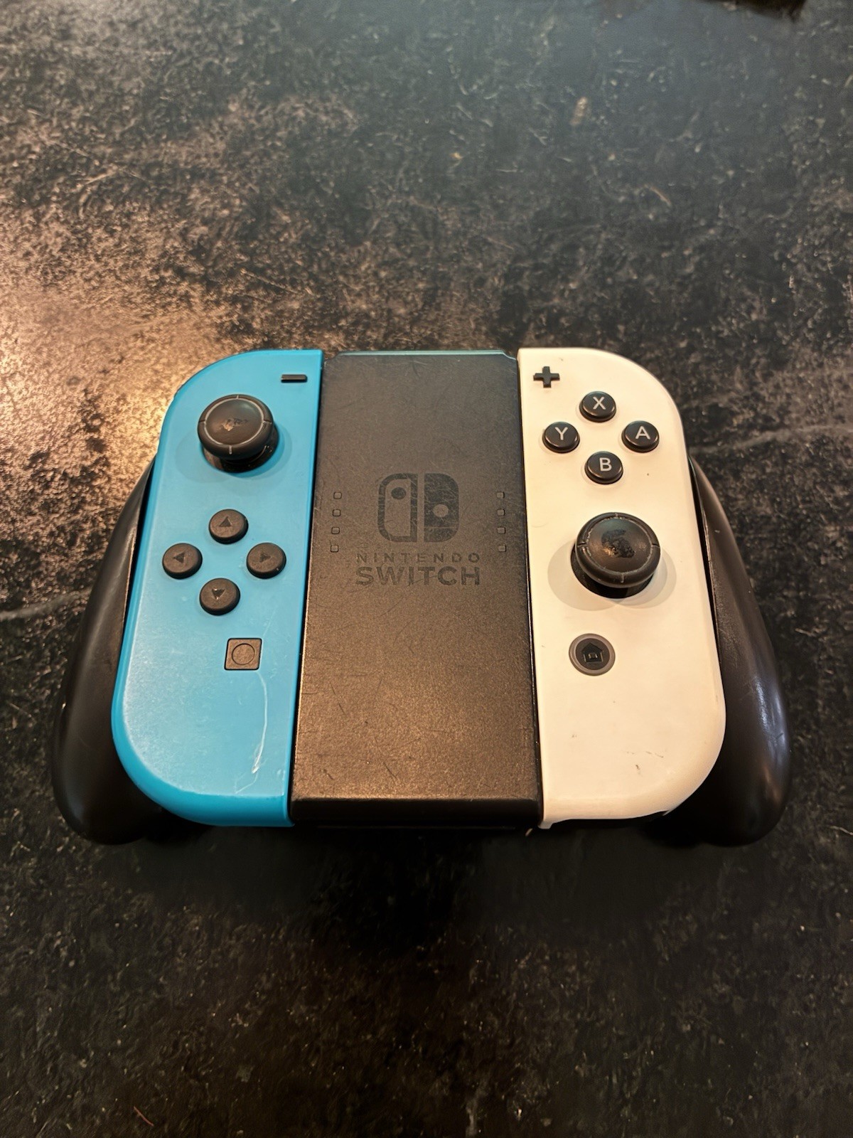 Used Nintendo Switch with Pro Controller in excellent condition
