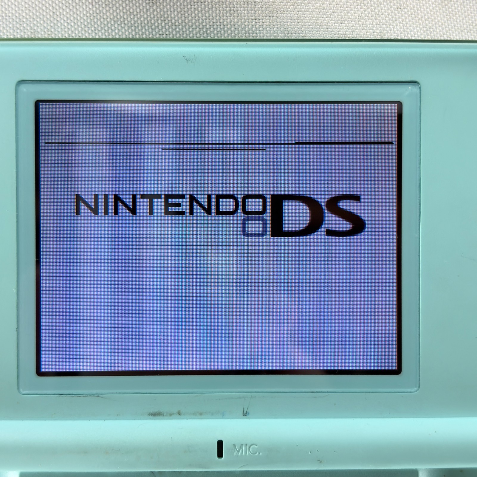 Nintendo DS Lite Ice Blue Handheld System – Doesn’t Read Games
