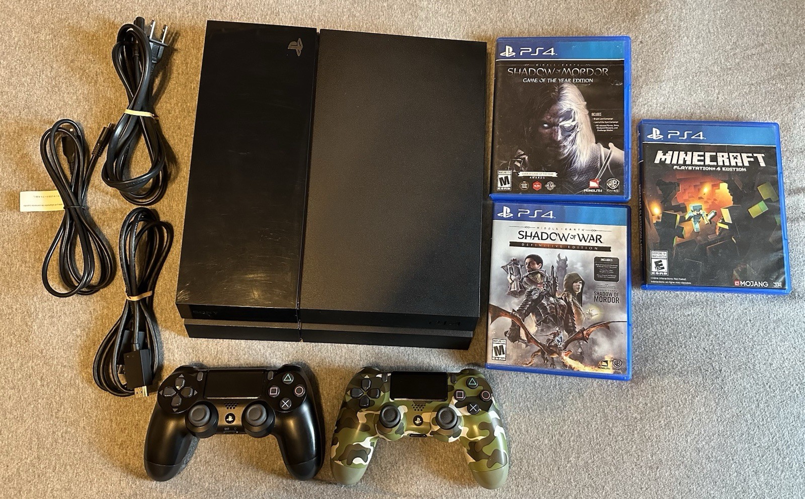 PlayStation 4 Console With Two Controllers And Three Games!