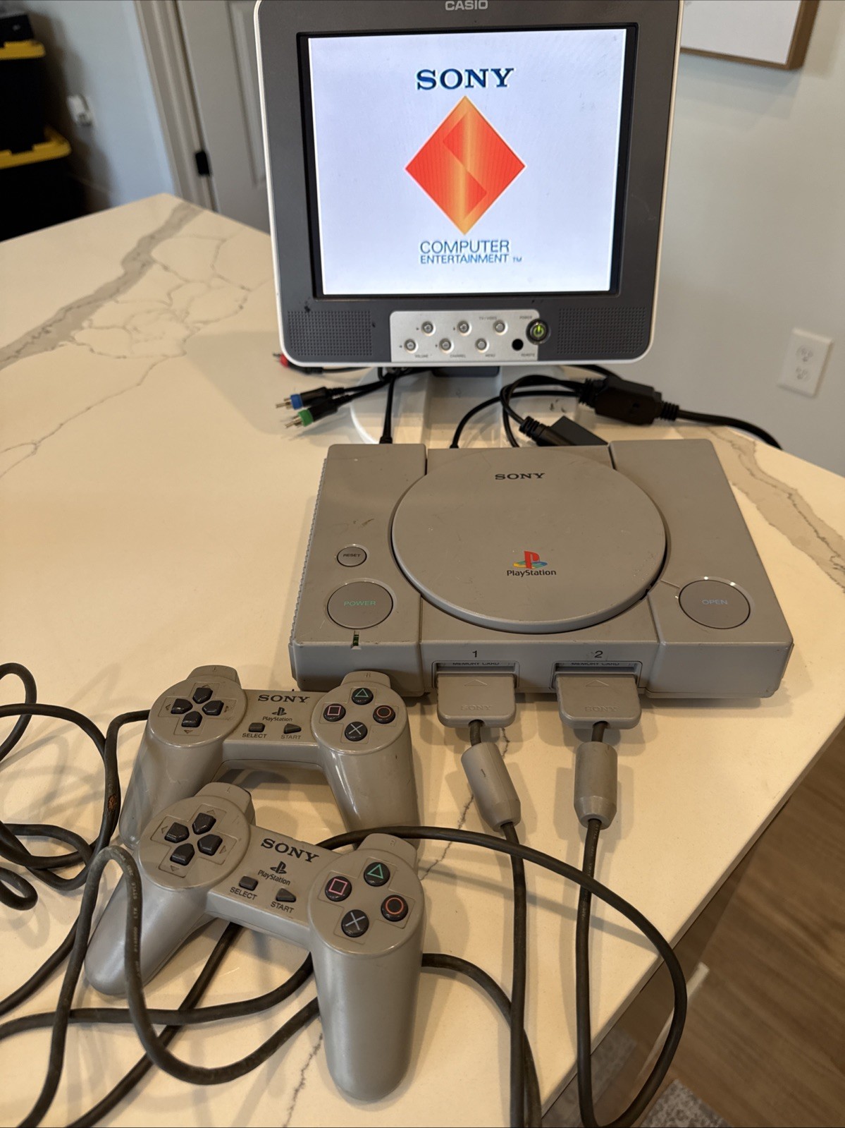PlayStation 1 SCPH-7501 Console & Controllers. Works. Has Some Cosmetic Defects.