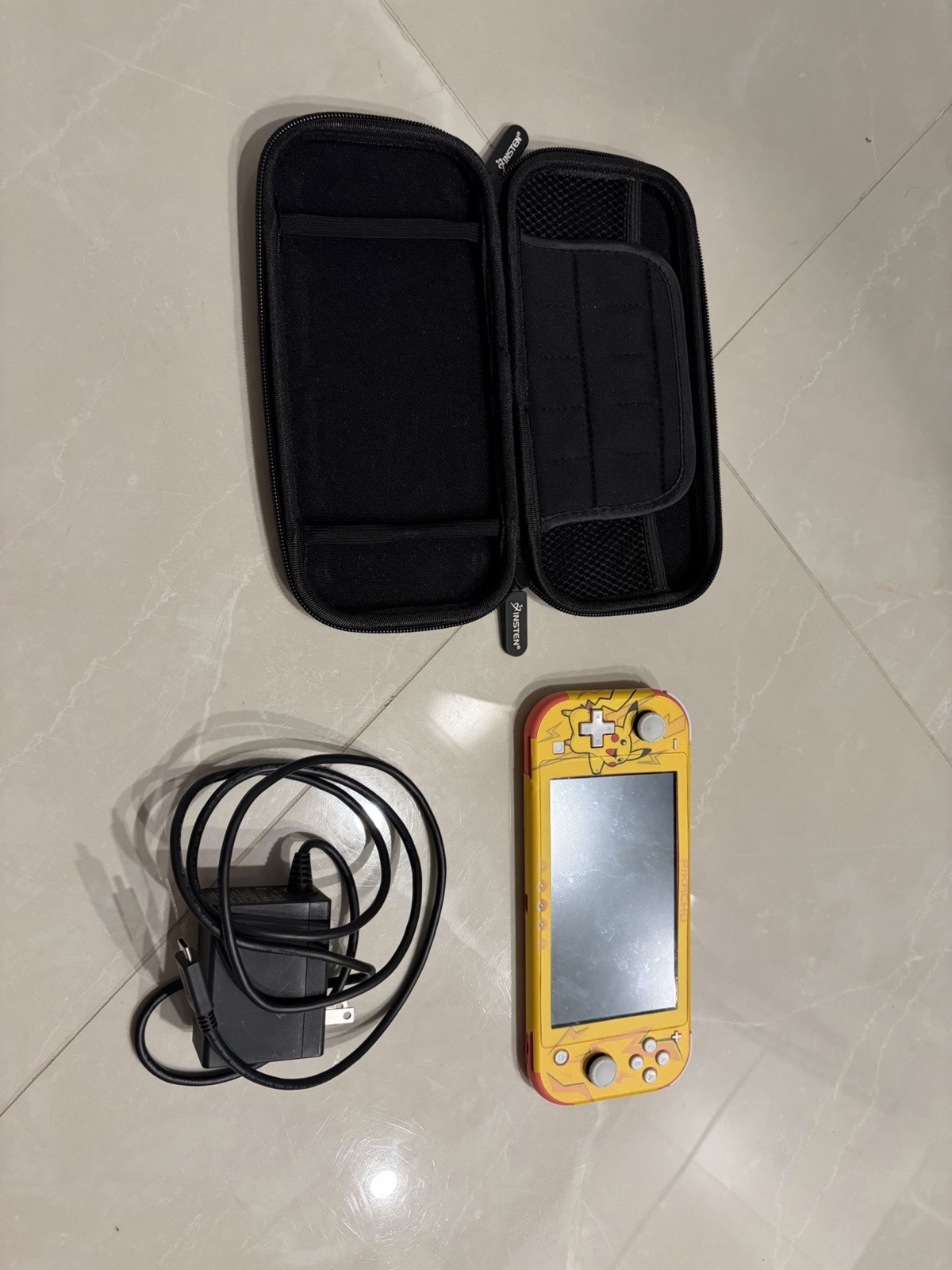 Nintendo Switch Lite Pink With Pikachu Cover/case and Charger Included