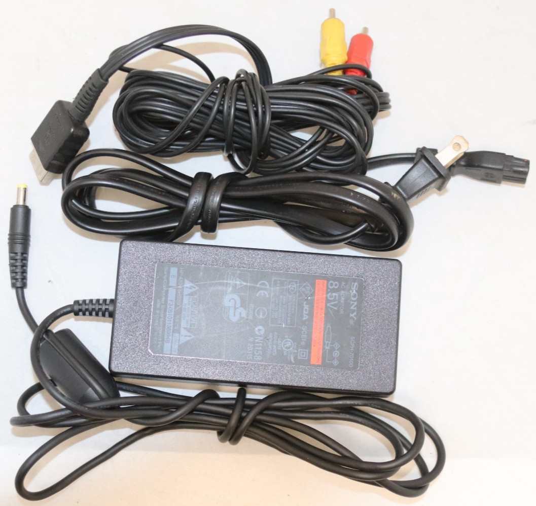 Sony PlayStation 2 Slim (SCPH-75001) W/ two controllers