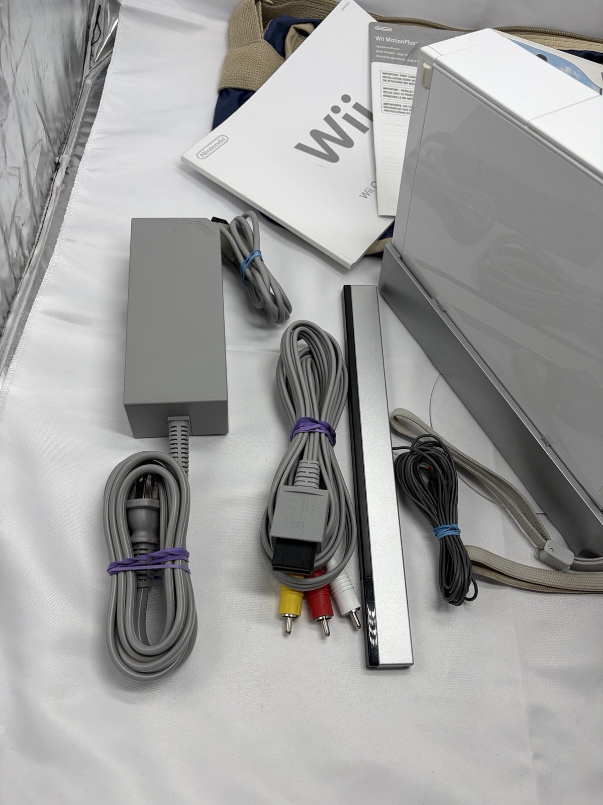 Nintendo Wii Console Bundle – 2 Controllers, Nunchuck, Power/AV Cords + 2 Games