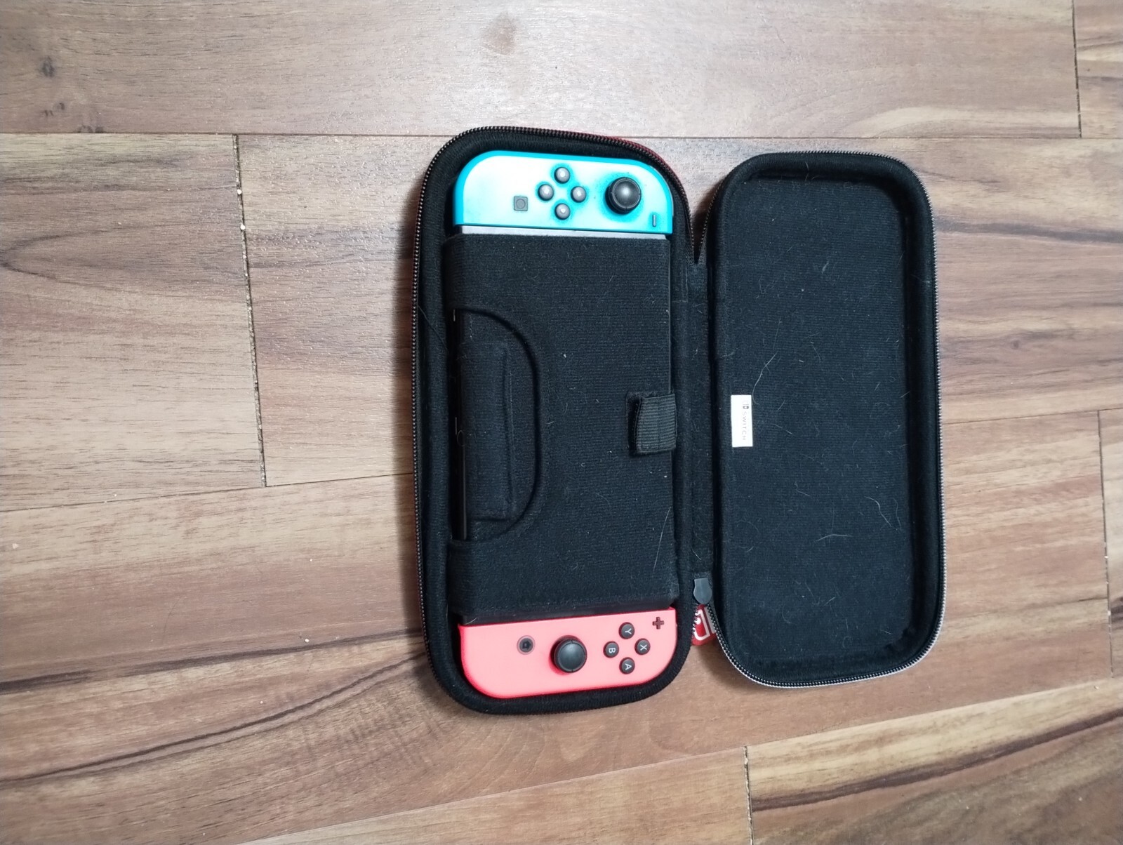 Nintendo Switch Console and games, carrier, Ring Fit, extra controllers
