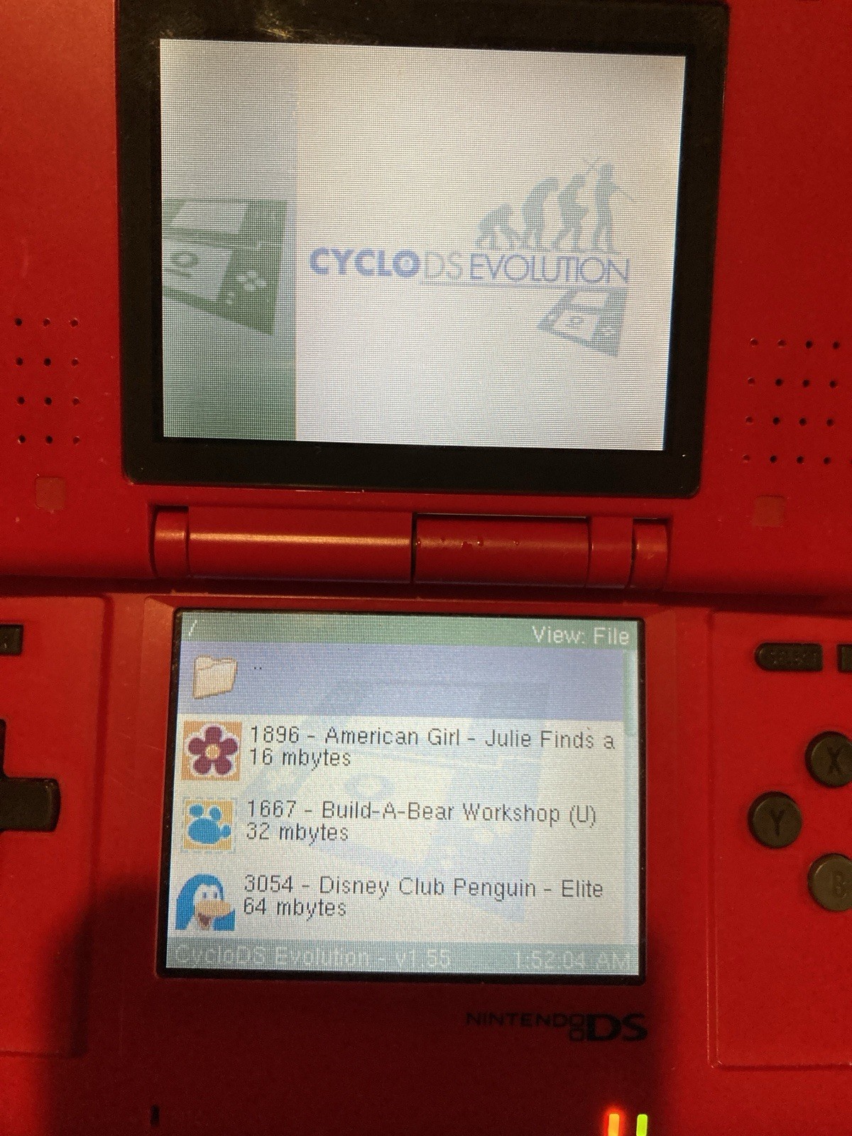 Nintendo DS Red Handheld Dual Screen Console with EVOLUTION MULTI-GAMES ON 2GB