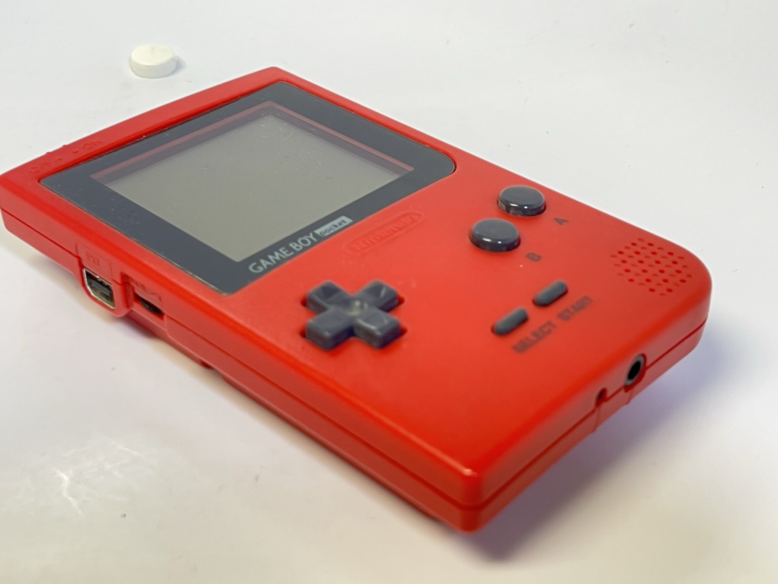 Nintendo Game Boy Pocket – Red In Good Condition.