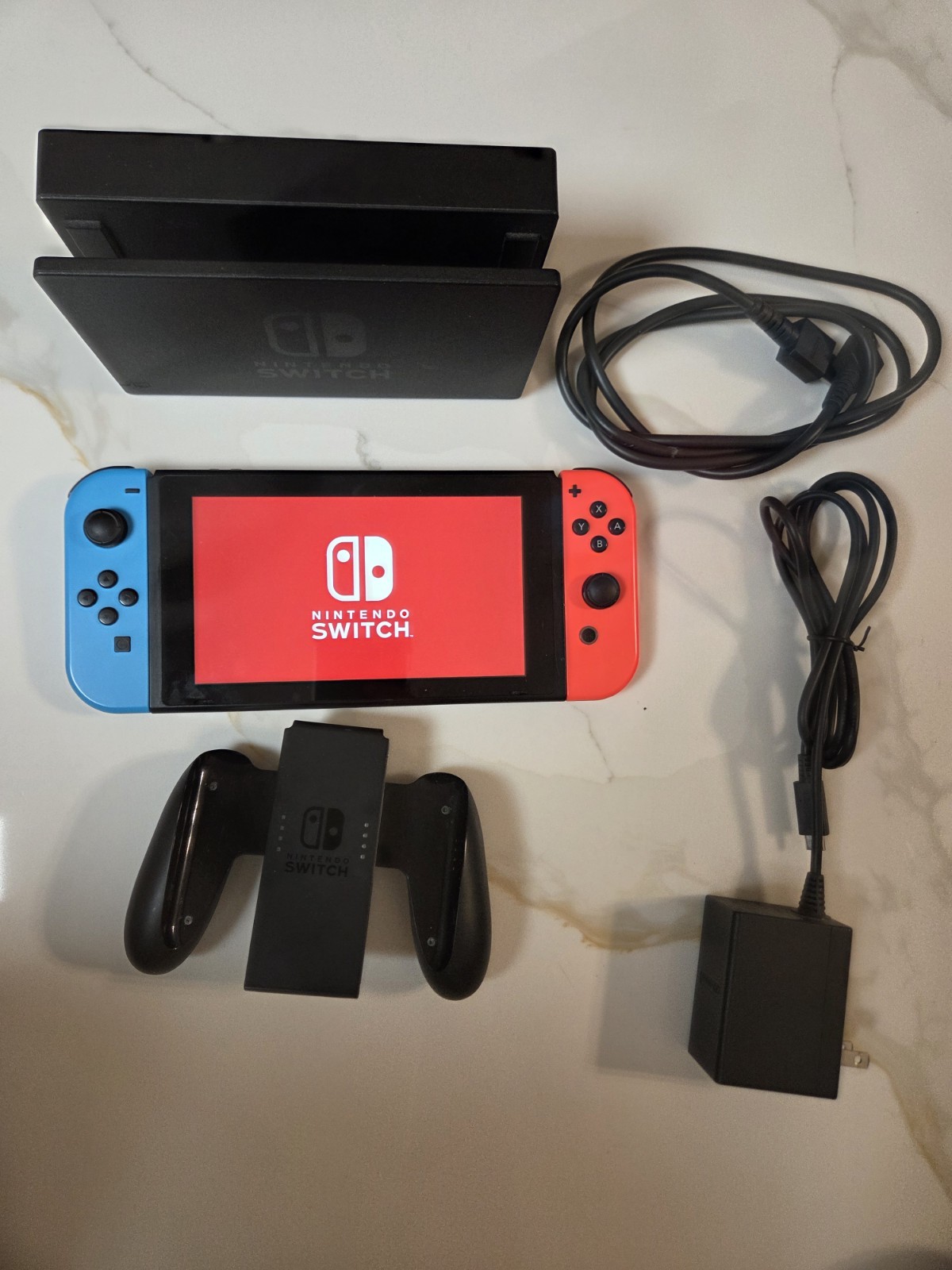 Nintendo Switch Console 128GB With Dock, Joycon Grip, And Travel Case