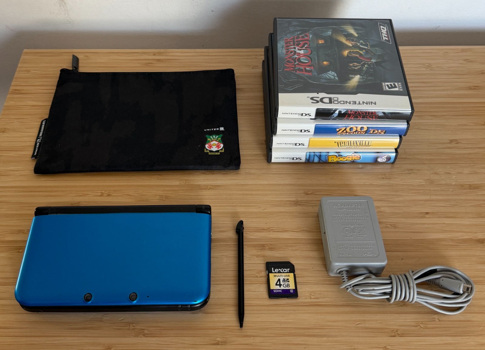 Nintendo 3DS XL Blue Handheld System 4GB (SPR-001) with 4 Games *TESTED* CLEAN!